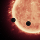 Artist’s conception of the two planets transiting their sun (Image: NASA, ESA, AND STSCI)